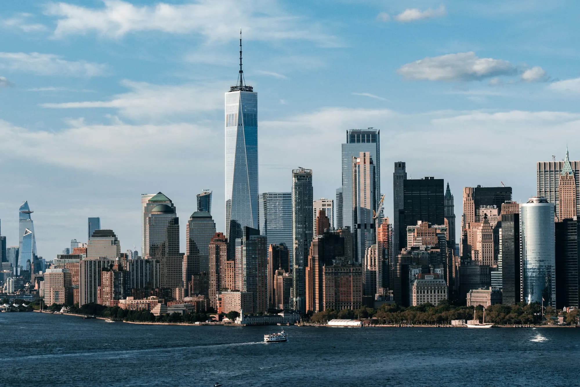 The Lower Manhattan skyline and One World Trade Center seen from New York Harbor